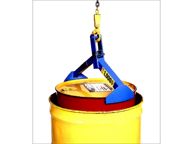 Model 91 Drum Lifter placing a 55-gallon (210 liter) steel drum into a salvage drum